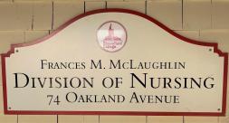 photo of sign board reading "Frances M. McLaughlin Division of Nursing"